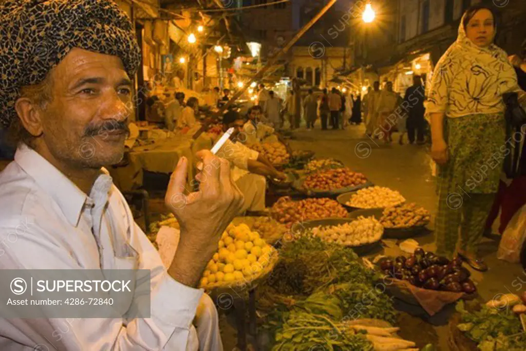 A fruit vendor in the old bazaar in Rawalpindi in Pakistan