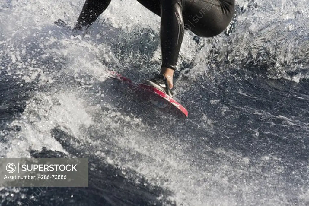 A closeup of a woman wakeboarding on Lake Tahoe in California
