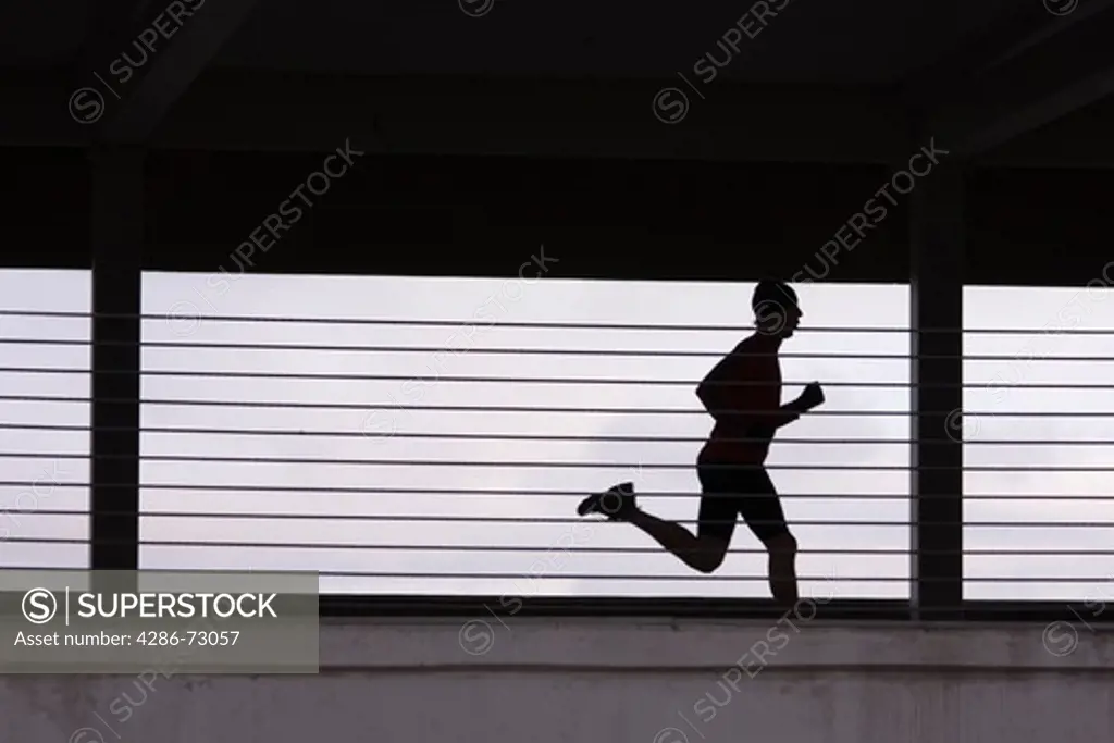 A man running in a parking garage in Reno in Nevada