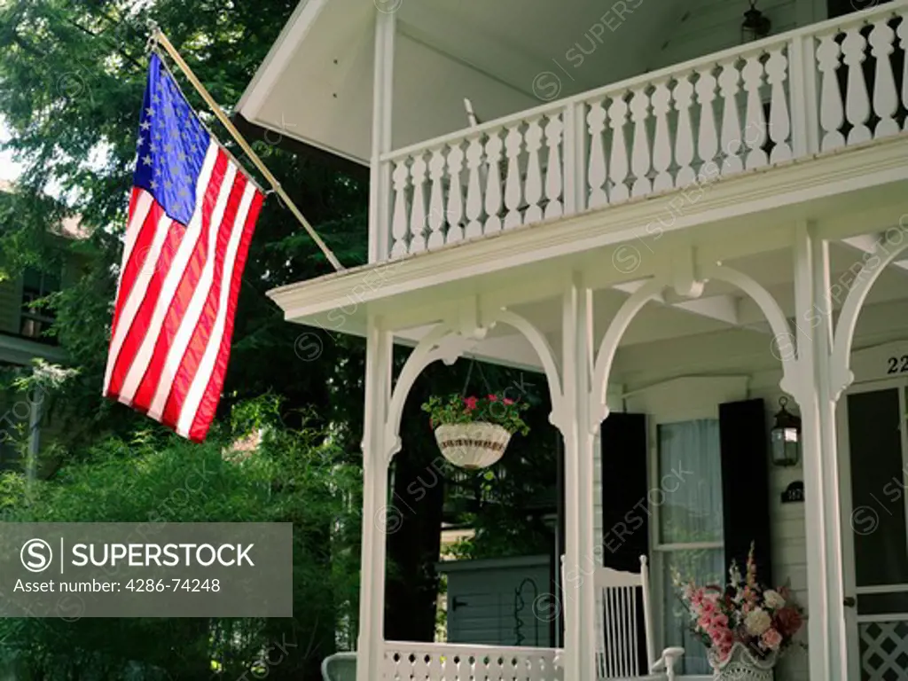 USA New York Chautauqua,Victorian home displaying the American flag