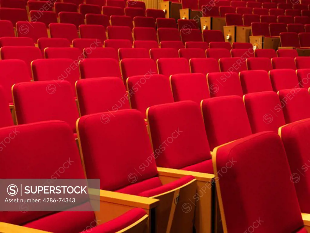 United Kingdom Manchester,rows of empty red seats in an auditorium