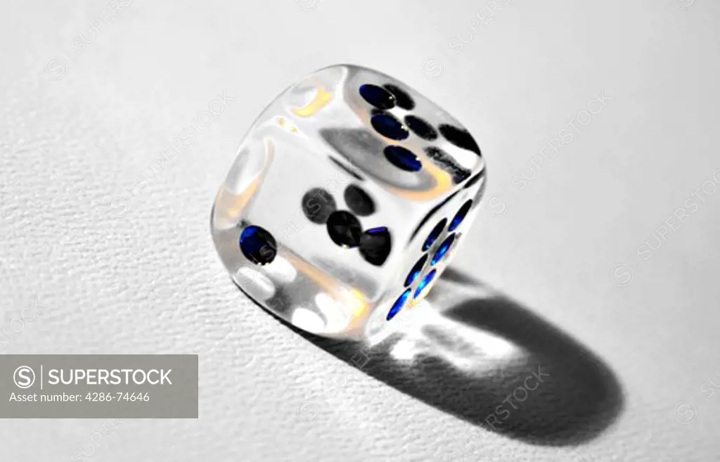Close-up of a bright transparent dice