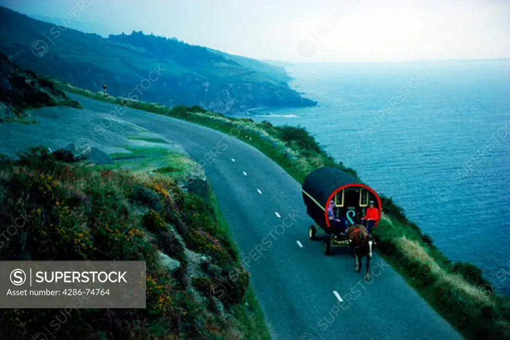 Horse and cart passing coastal road on Dingle Peninsula in County Kerry  in Southwest  Ireland