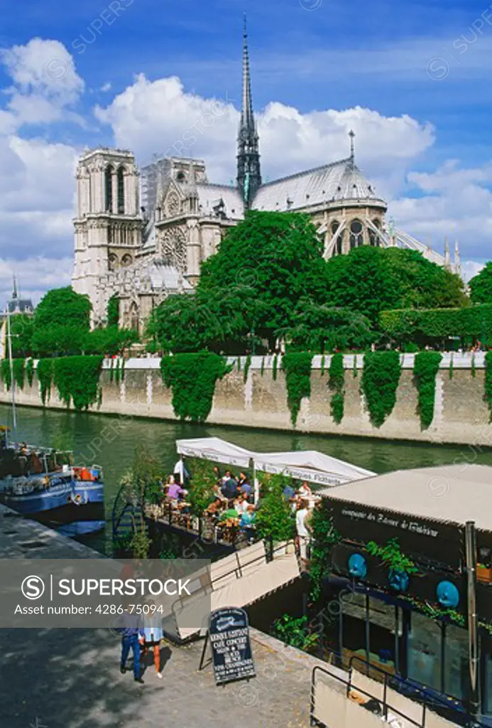 Restaurant boats on River Seine with Notre Dame