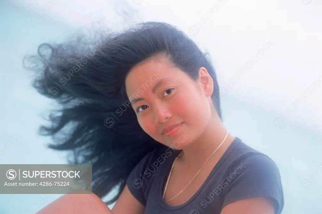 Vietnamese woman on windy day