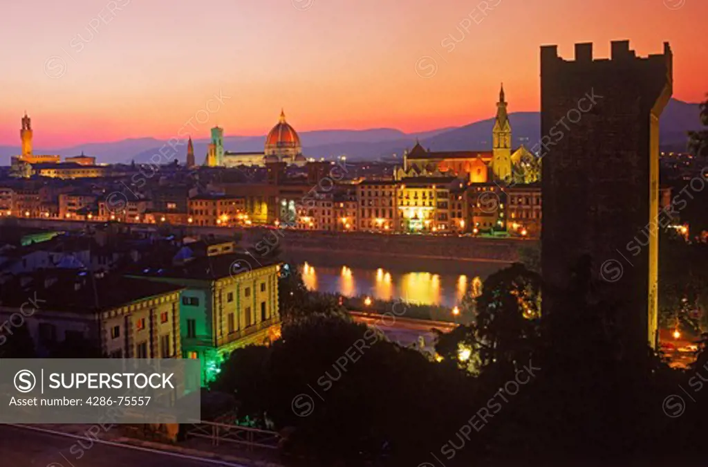 Florence on Arno River with Piazza della Signoria left Duomo center and Santa Croce Cathedral right at dusk
