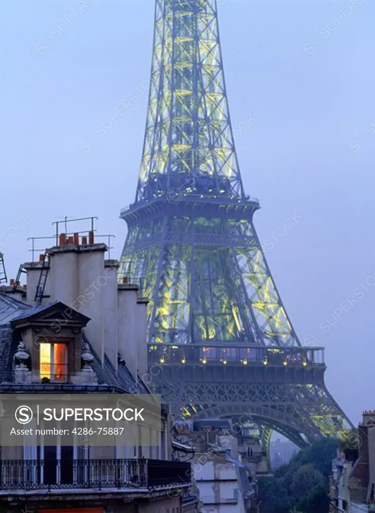 Light in apartment with Eiffel Tower depicting Paris night life
