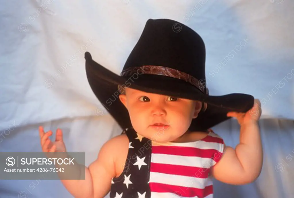 Baby 7-12 month with big cowboy hat and USA costume