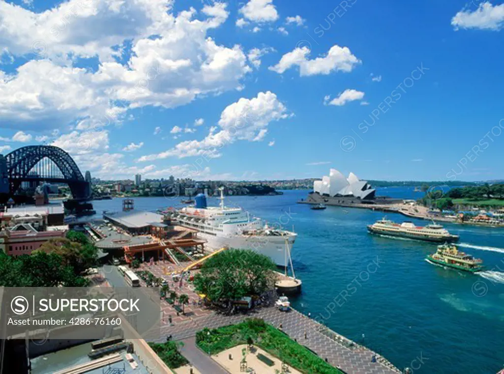 Passenger ship and ferryboats at the Sydney Harbor Quay with Opera House