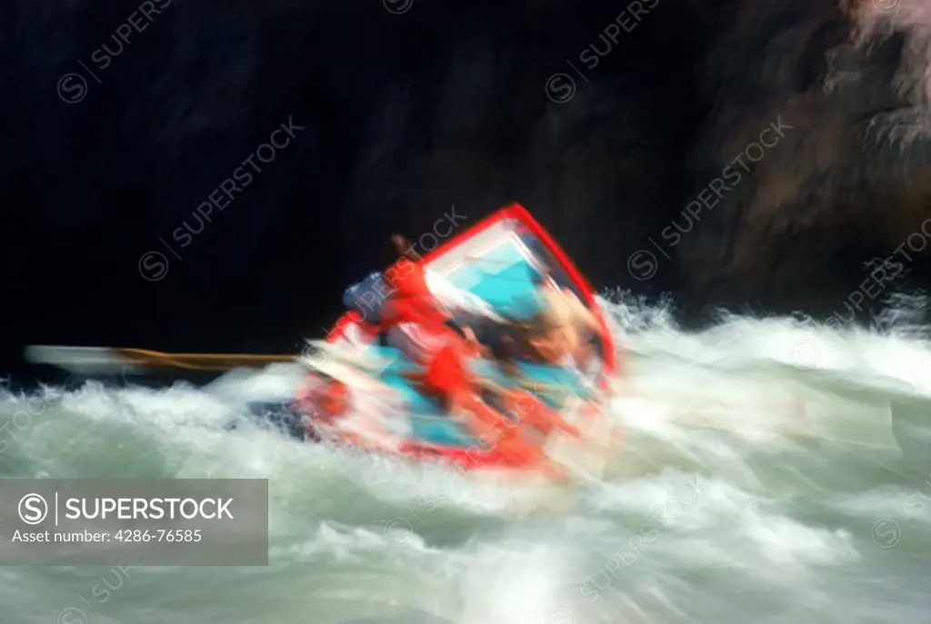 Grand Canyon Dory bouncing through whitewater rapids at Granite Falls on Colorado River