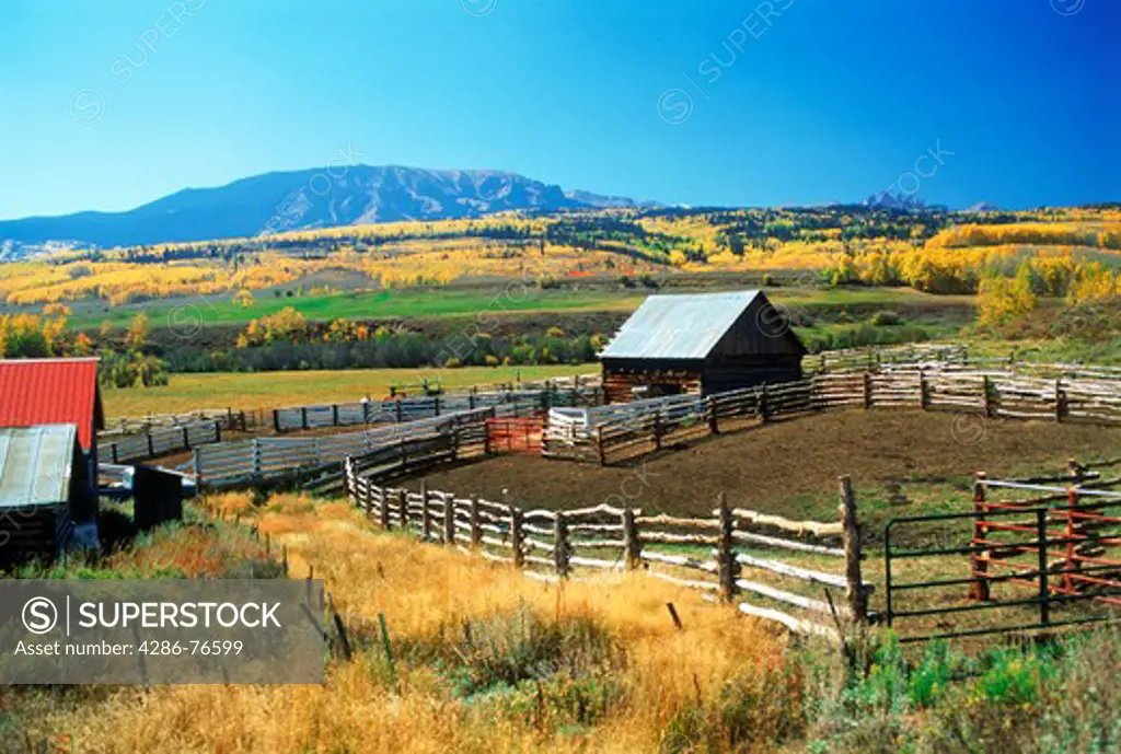 Farm house and cattle or horse corrals on ranch at Ohio Creek in the Rocky Mountains of Colorado