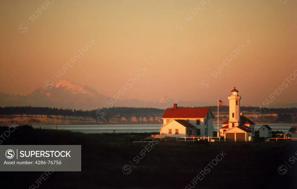 Point Wilson Lighthouse in Fort Worden State Park at sunrise near Port Townsend, Washington USA