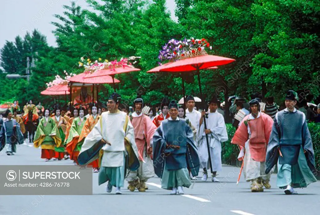 Traditional colorful costumes and kimonos at Aoi Matsuri Festival in Kyoto. Japan