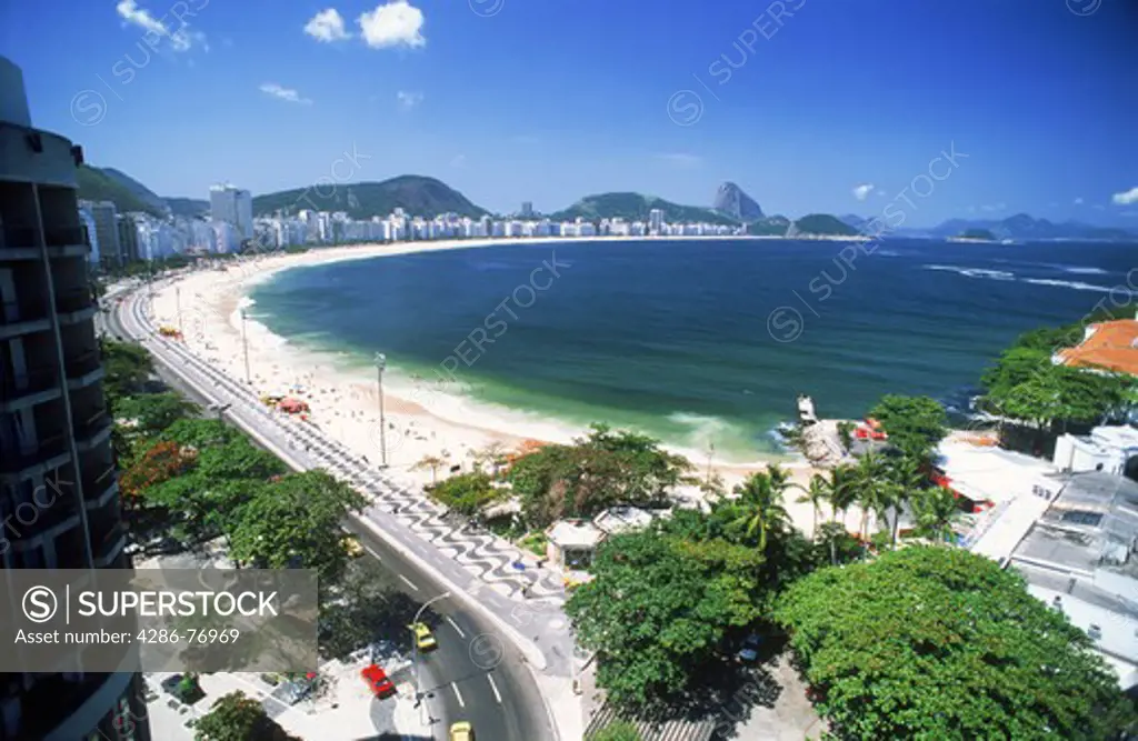 Hotels and sandy shore along Copacabana Beach in Rio de Janeiro