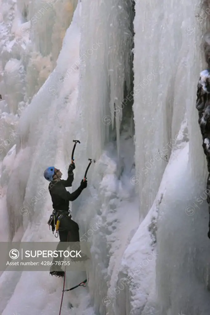 Man ice climbing in Box Canyon, Ouray, Colorado