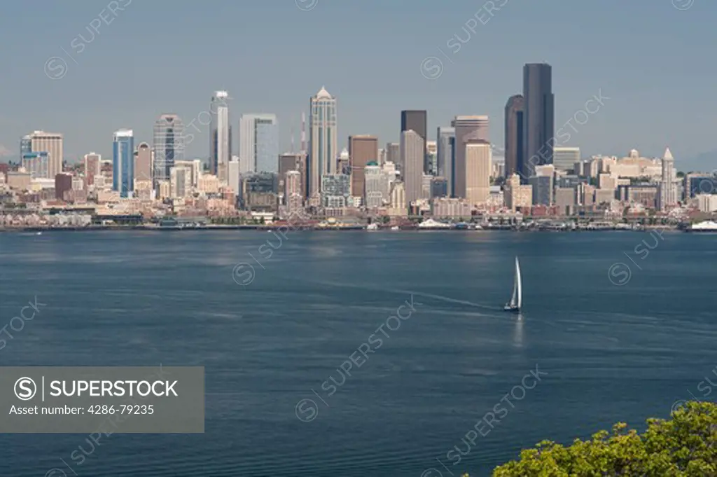 Seattle skyline from West Seattle with boats in Elliott Bay on a bright sunny day Washington State USA