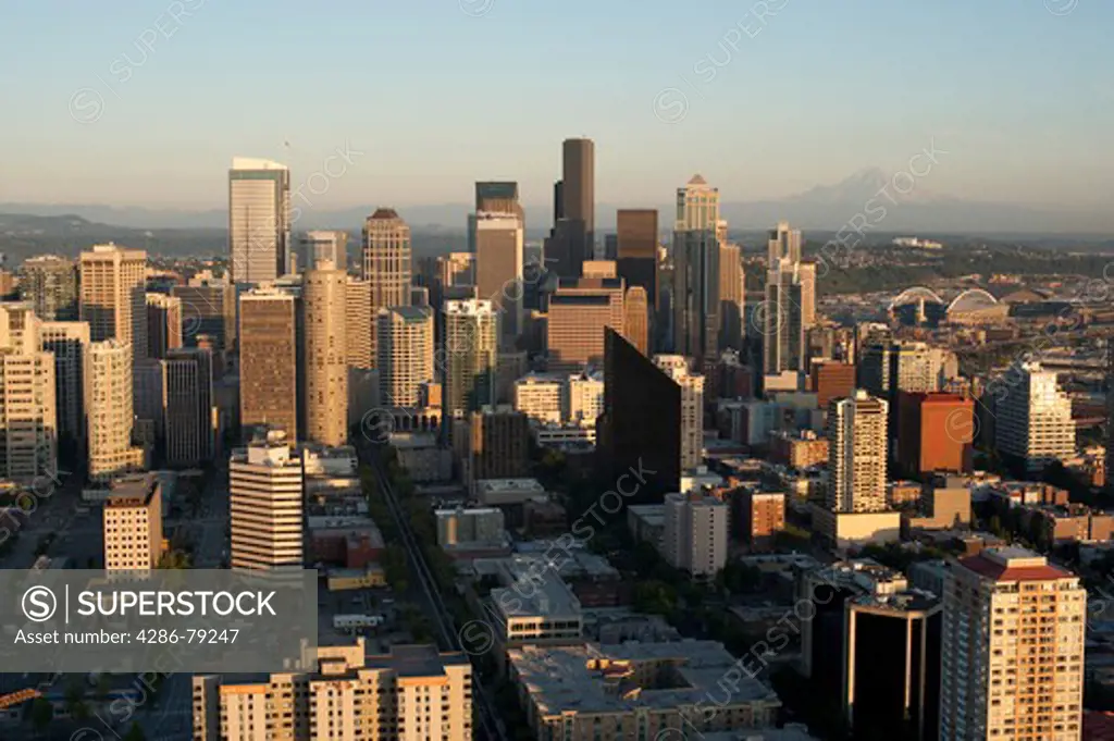 Seattle Skyline from Space Needle with Mount Rainier and downtown building at sunset Seattle Washington State USA