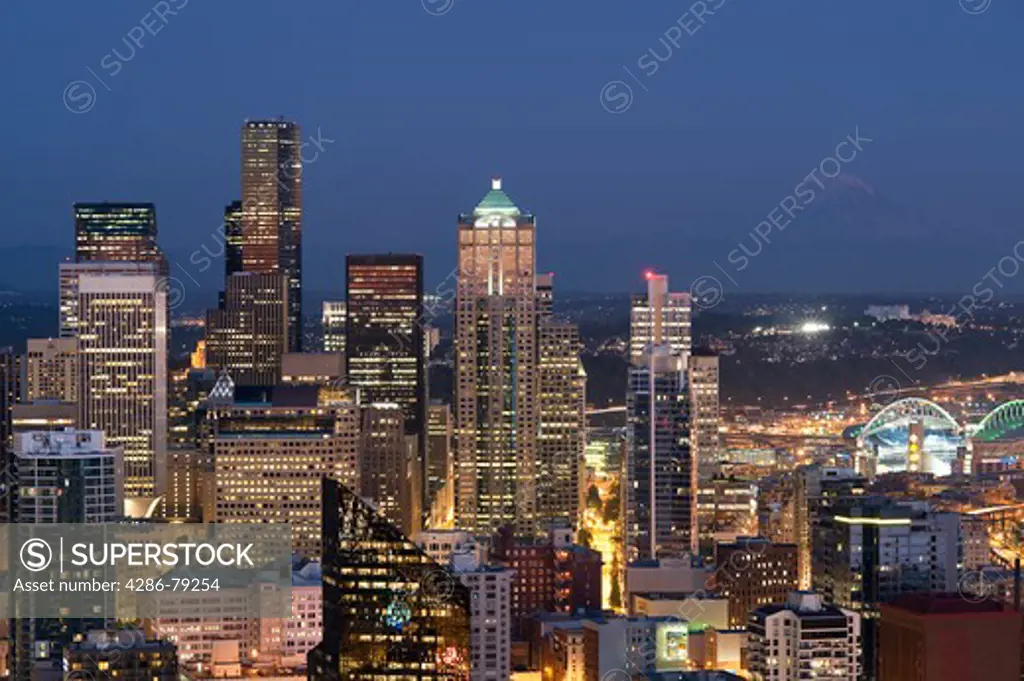 Seattle Skyline from Space Needle with Mount Rainier and downtown building at twilight Seattle Washington State USA
