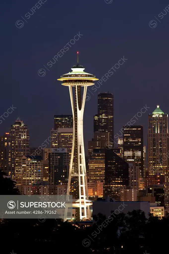 Seattle skyline with Space Needle and downtown buildings at sunset with city lights Seattle, Washington State USA