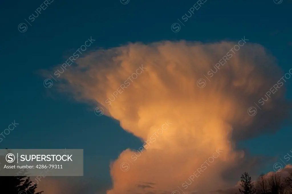 Stormy weather with thunderstorms and swelling Anvil Cumulonimbus