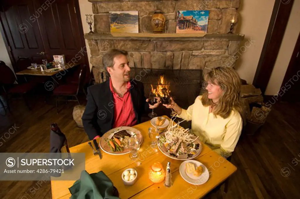couple enjoys dining in a rustic restaurant