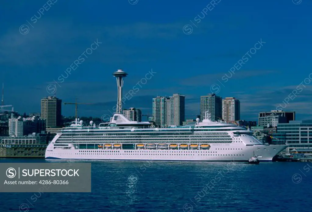 Cruise ship docked with Seattle skyline in background, WA