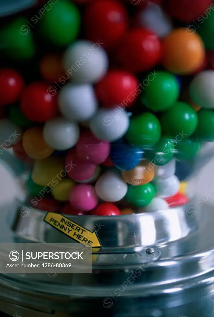 Close-up of gum balls in a gum ball machine