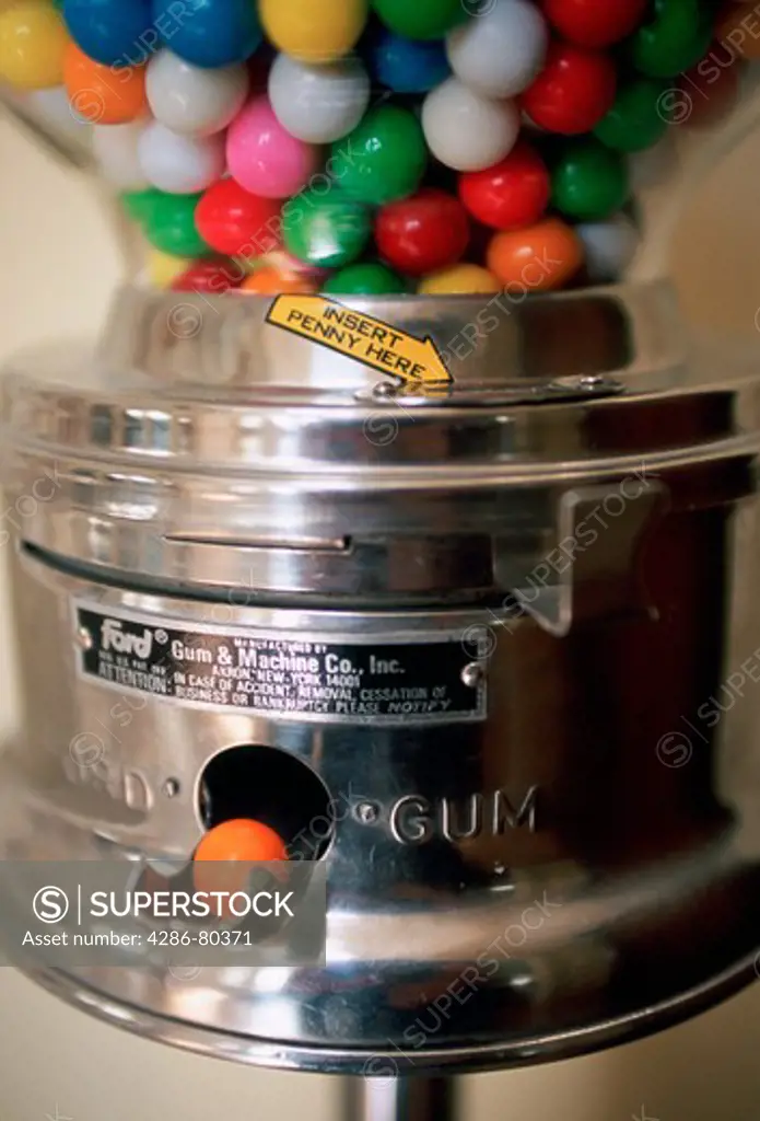 Close-up of gum balls in a gum ball machine