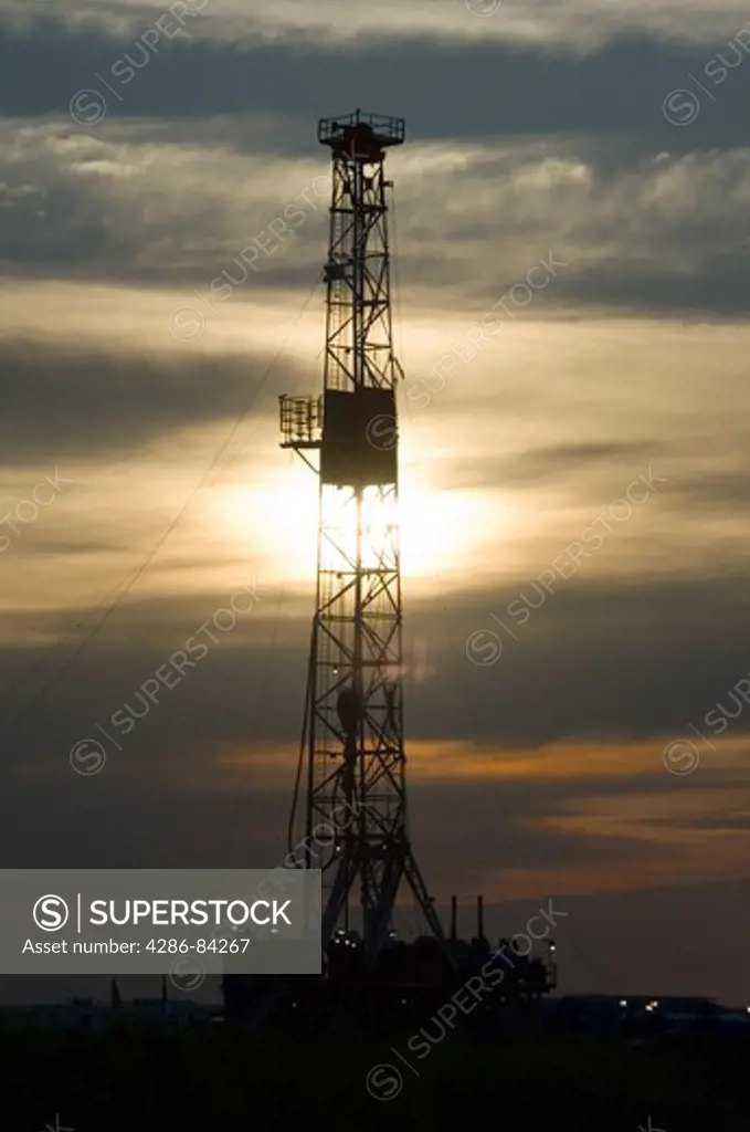 Drilling rig at sunset in west Texas.