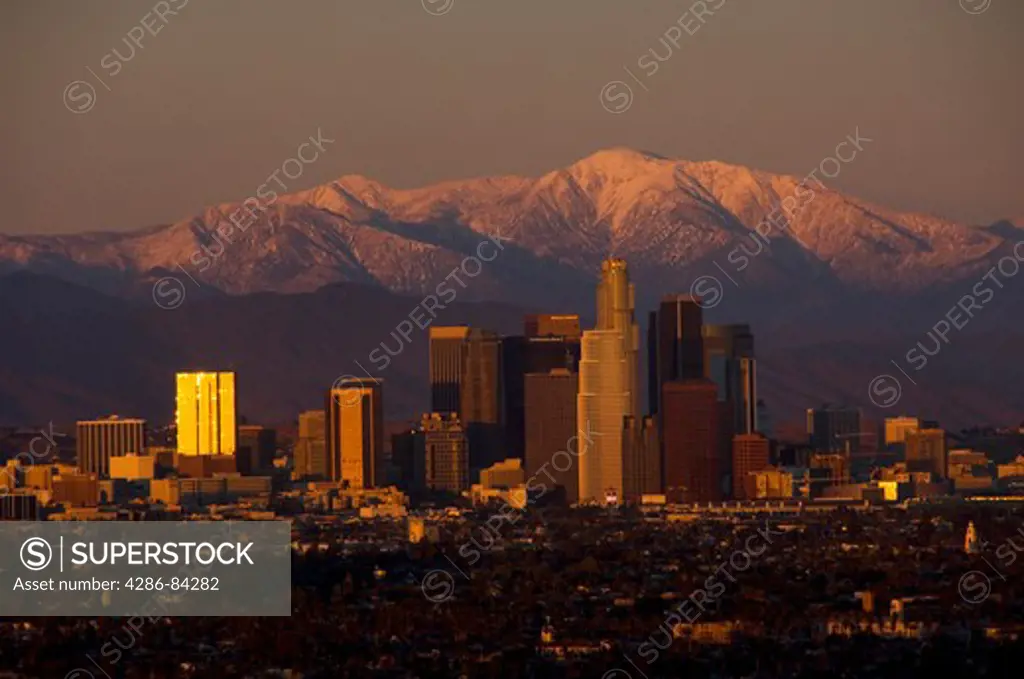 Sunset over Los Angeles skyline with Mt. Baldy.