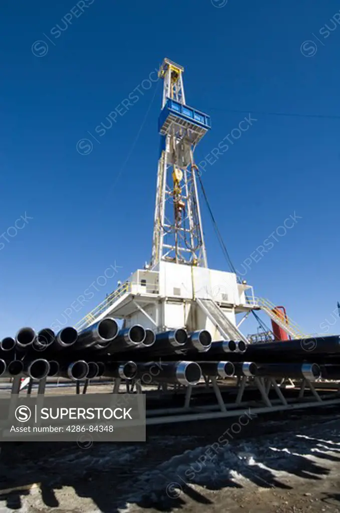 Drill casing near Wyoming drilling rig.