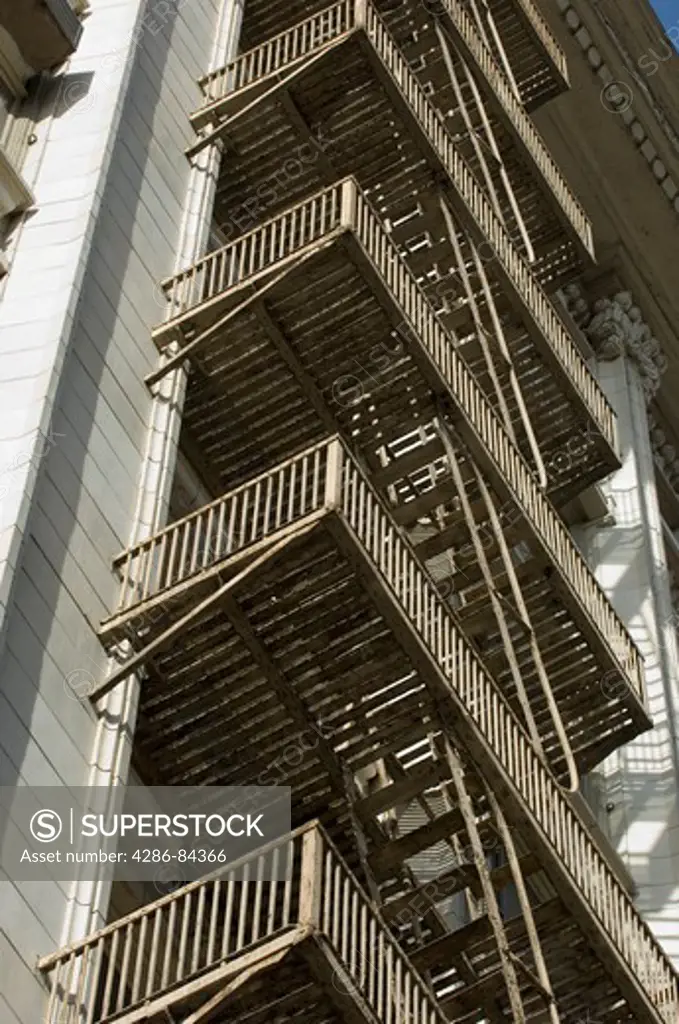 Fire escapes on the side of old buildings in Los Angeles.