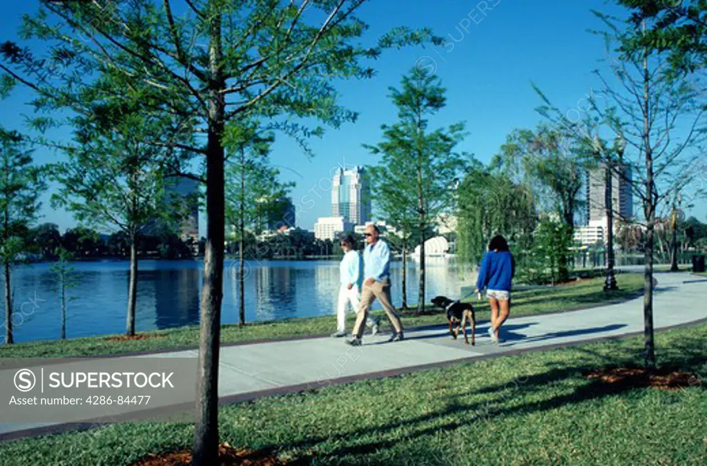 People walking Lake Eola Park Orlando Florida