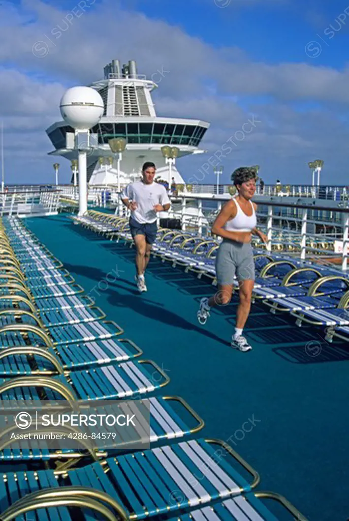 Released, couple jogging on deck Star of America cruise ship