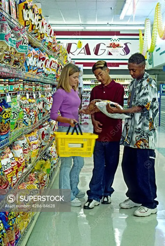 Released young teens mixed ethnic genders shopping in grocery store