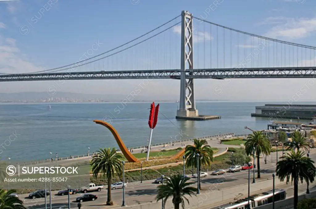 Overview of Embarcadero waterfront with Bay Bridge in background San Francisco California