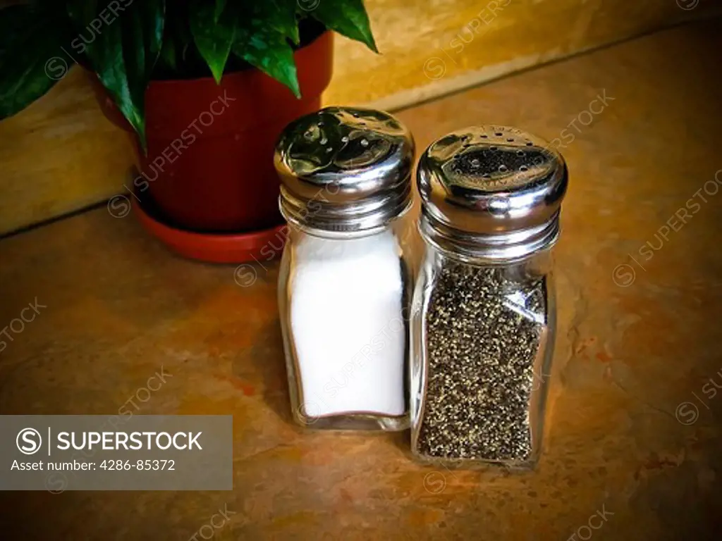 Salt and pepper shakers on a table