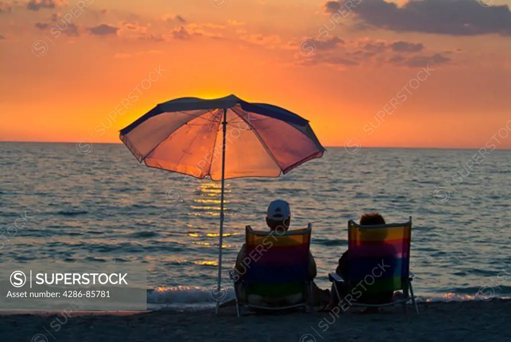 couple relaxing at the beach-sunset-florida west coast-2008