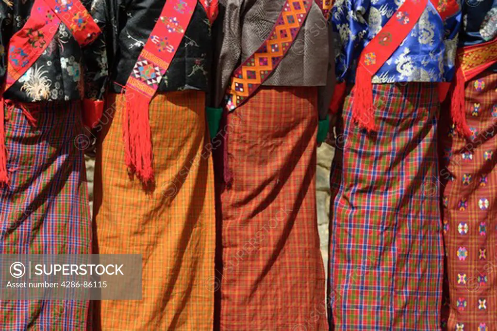 Elegant clothing of dancers at the Tsechu (festival), Tangbi Mani, Bhutan