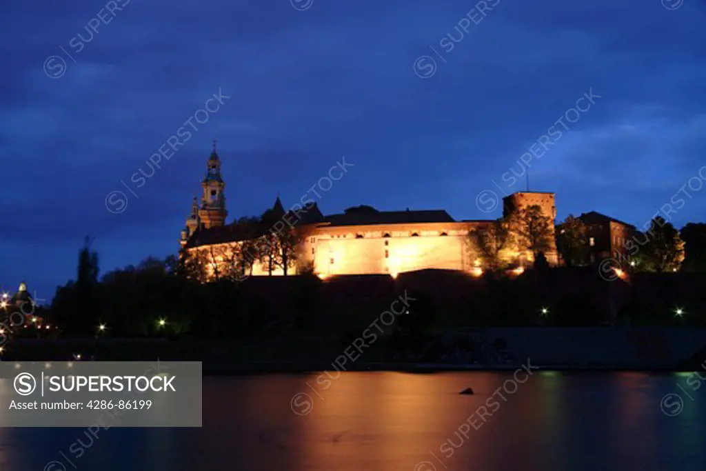 Reflexes of Wawel hill cathedral on the Vistula river, Krakow, Poland