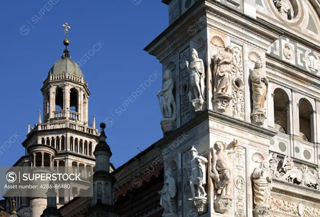The gothic faade and the bell tower of the Certosa di Pavia, Pavia, Italy
