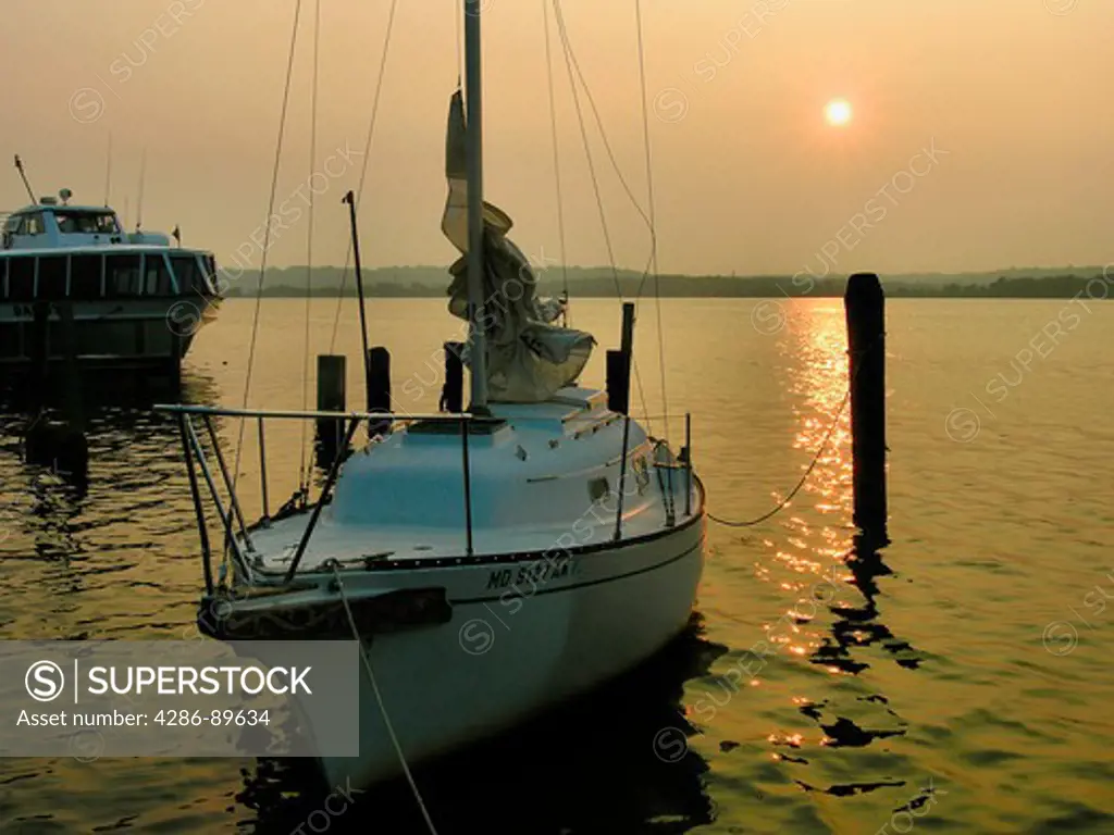 Boats at sunrise, Potomac River, Alexandria, VA