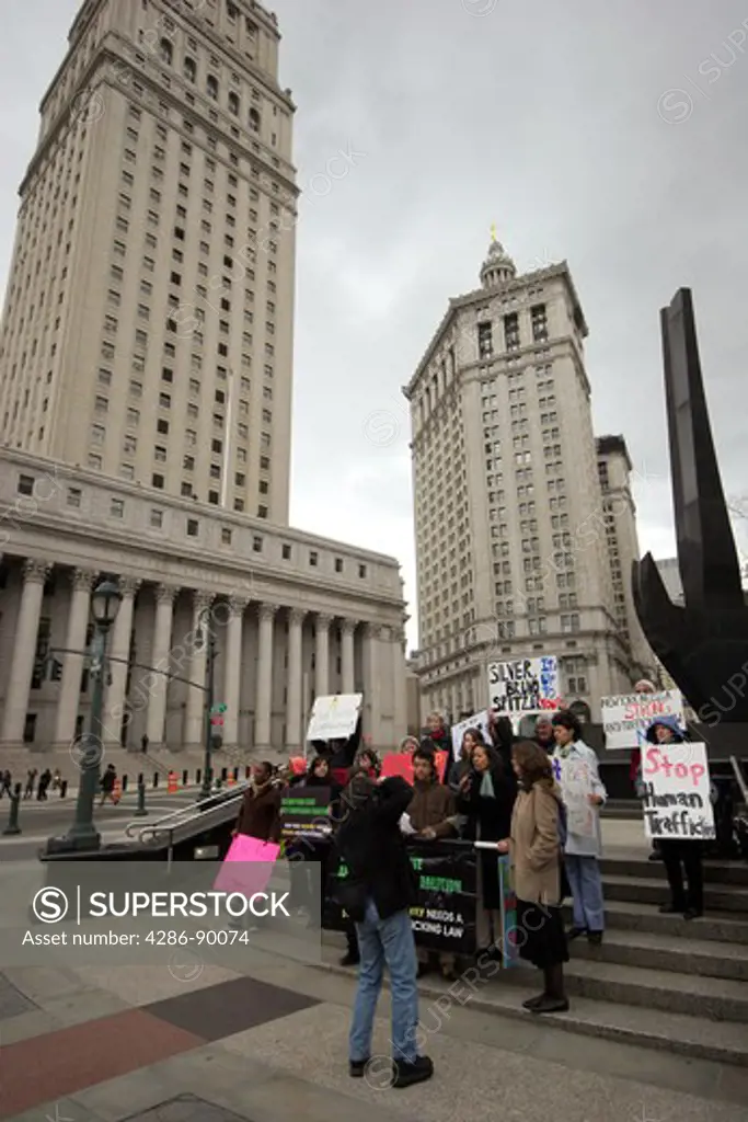 Protesters picketing over human trafficking laws outside state courthouse, lower Manhattan, New York