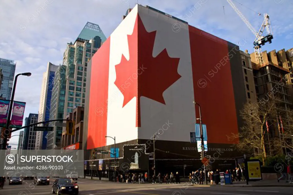 Huge patriotic Canadian Flag on building during the 2010 Winter Olympic Games, Vancouver, Canada