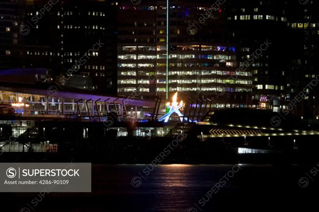 Lit Olympic Cauldron beside Media Center and Canada Place along the waterfront during the 2010 Winter Olympic Games, Vancouver, Canada