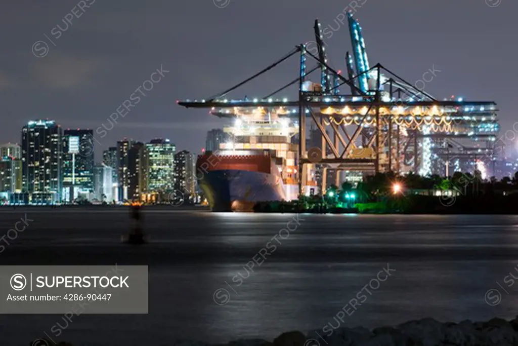 Gantry cranes unload freighter at Port of Miami, Miami, FL