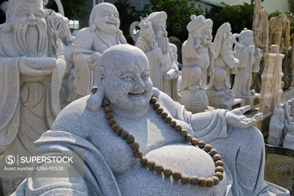 Stone carving of Buddha at stone works, Quanzhou, Fujian Province, China