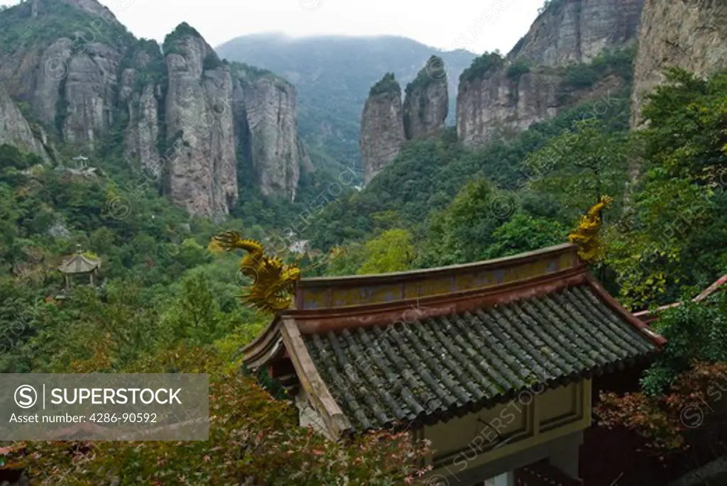 Taoist temple gate overlooking mountain valley, Yangdang Mountains, Wenzhou, Zheijiang Province, China