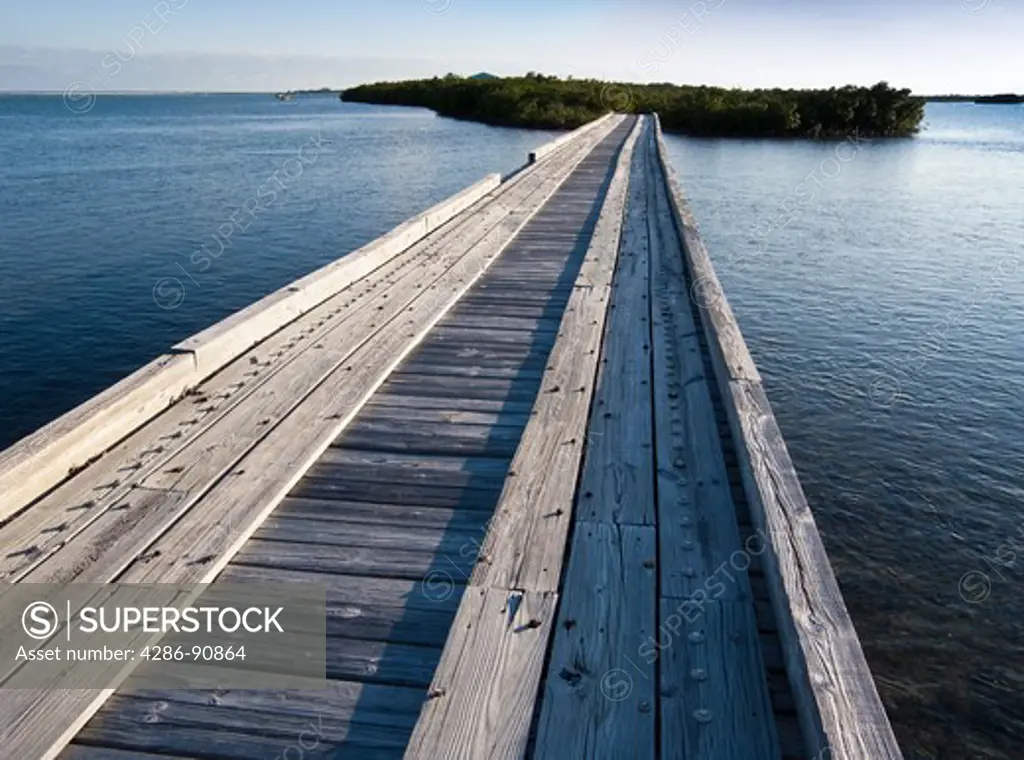 Abandoned wooden bridge over calm water, Florida Keys, Florida, USA