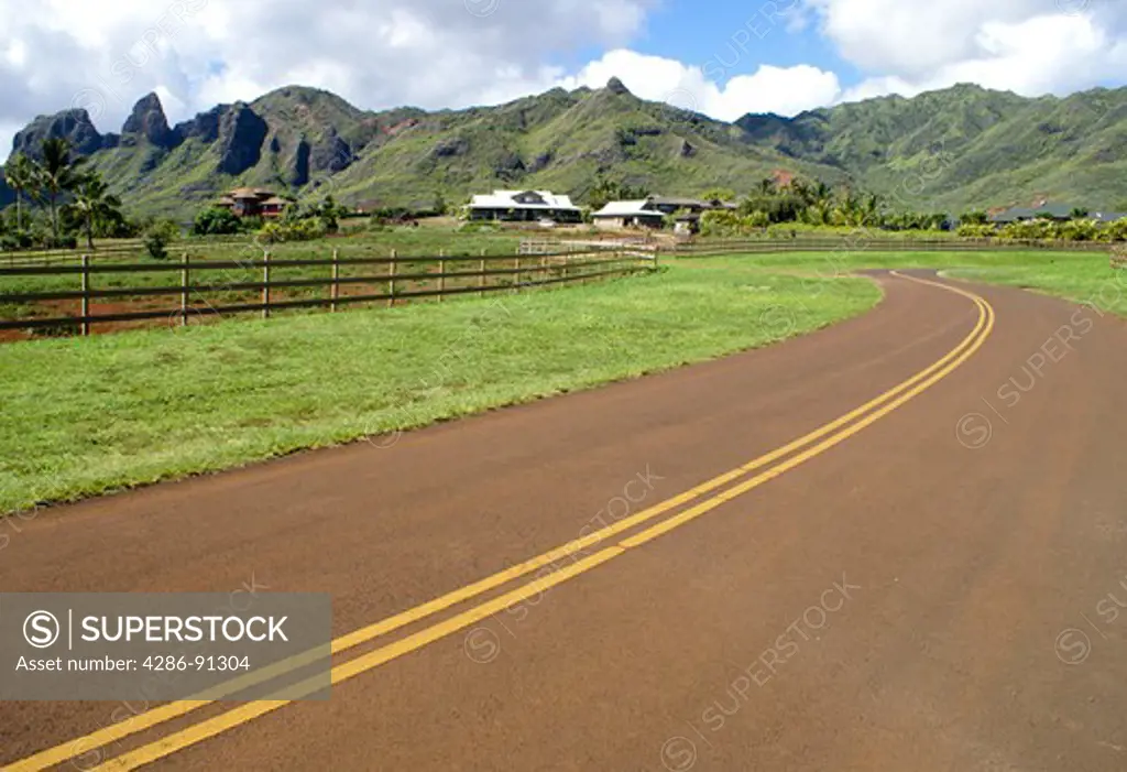 Road winding through new building development on Kaua'i in the Hawaiian Islands.